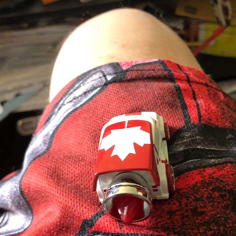 Red & White Maple Leaf Toy Car